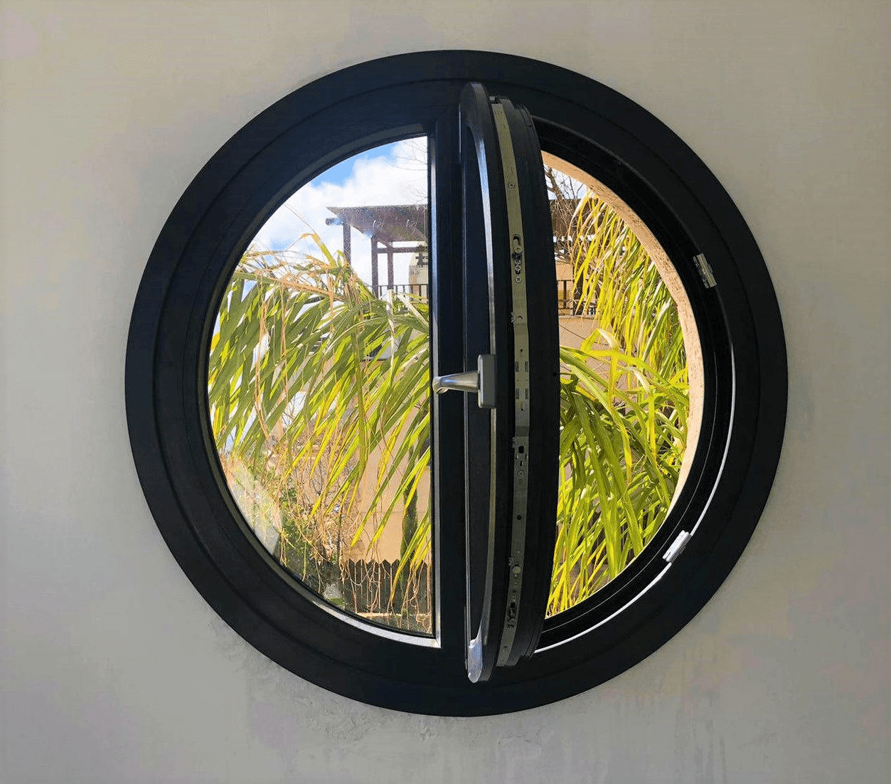 Rows of oblong oval windows marking time on the floor of the L House (top, middle) and a central-axis circle window from manufacturer Kaptain (bottom). Photos: Trieu Chen (top, middle)
