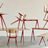 The light but hardwearing Pyramid café table and Result chair from HAY, featuring the strength of a metal frame alongside the warmth of wood