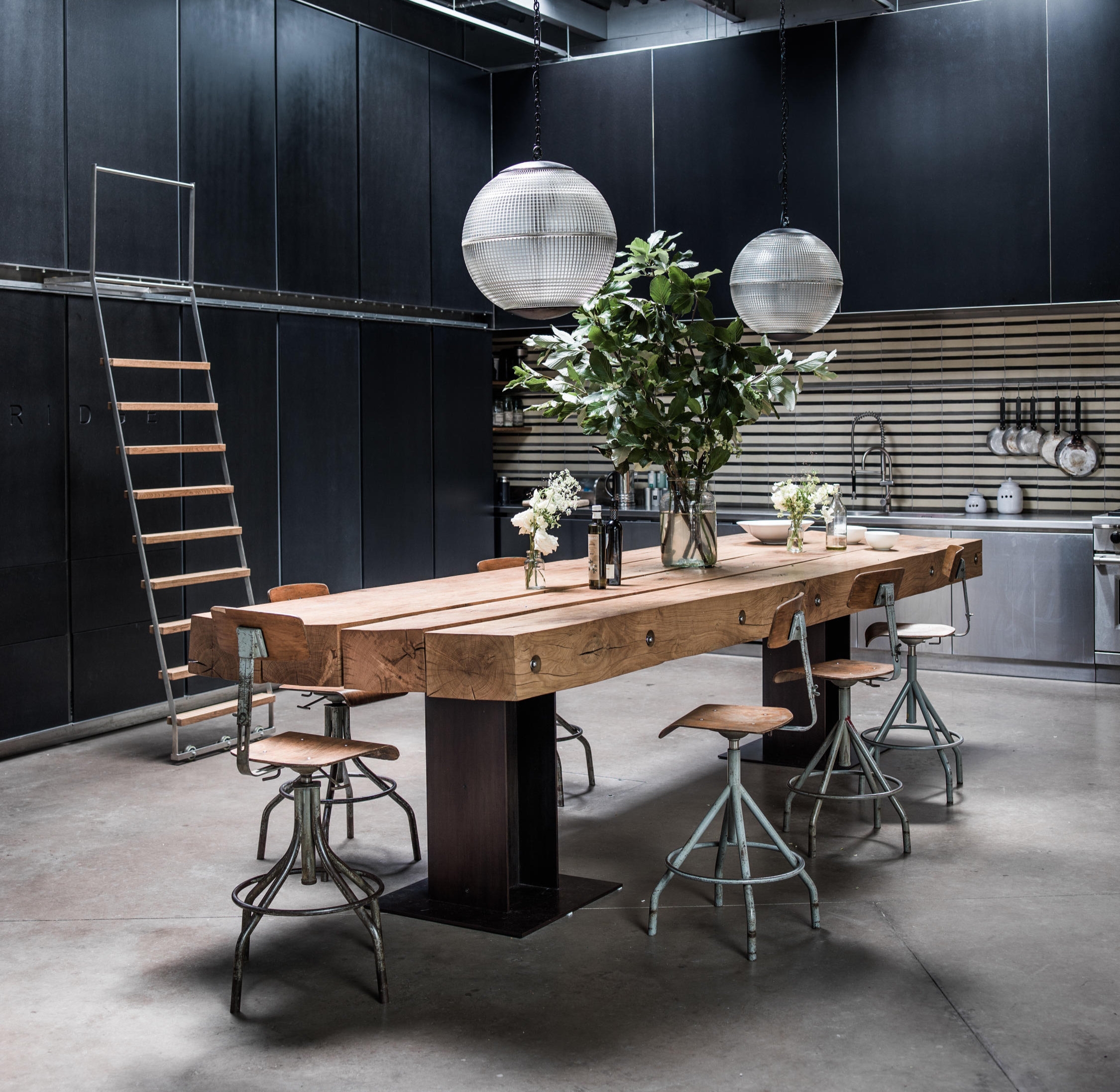 The Camden Town Houses uses the former film studio’s height to full effect with two interior ladders, one in the fashion studio’s reference library, one in the home’s kitchen. Photos: Jeremy Wilson