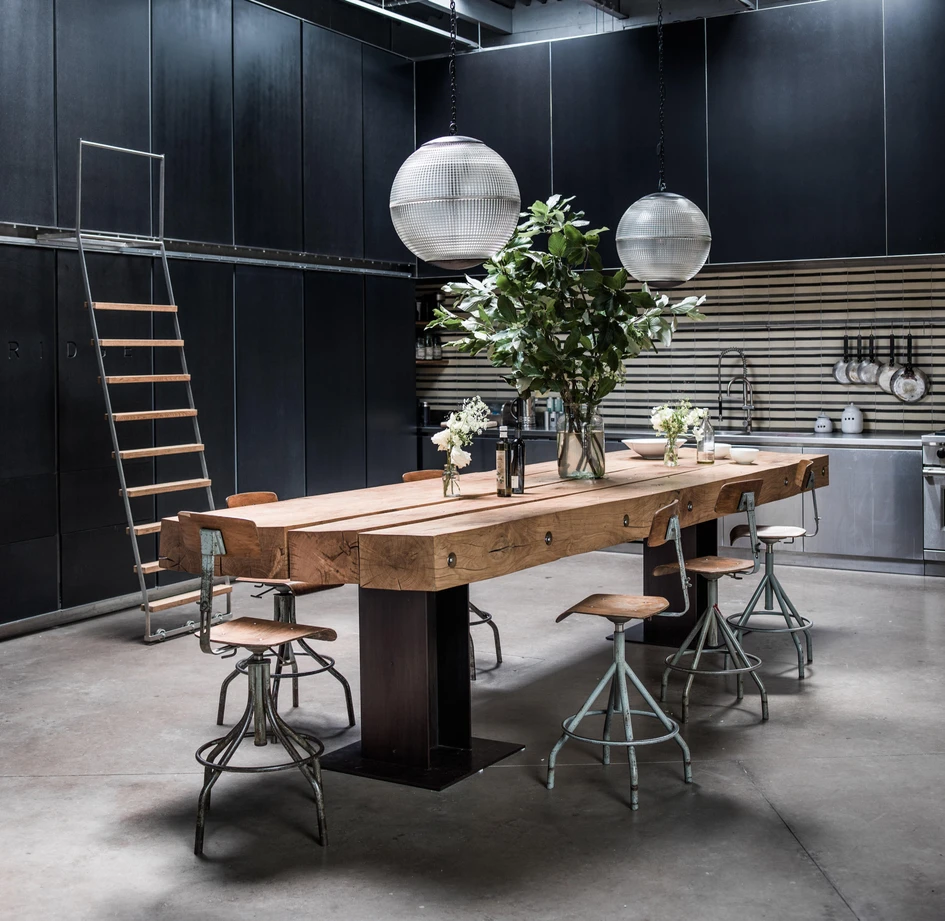 The Camden Town Houses uses the former film studio’s height to full effect with two interior ladders, one in the fashion studio’s reference library, one in the home’s kitchen. Photos: Jeremy Wilson