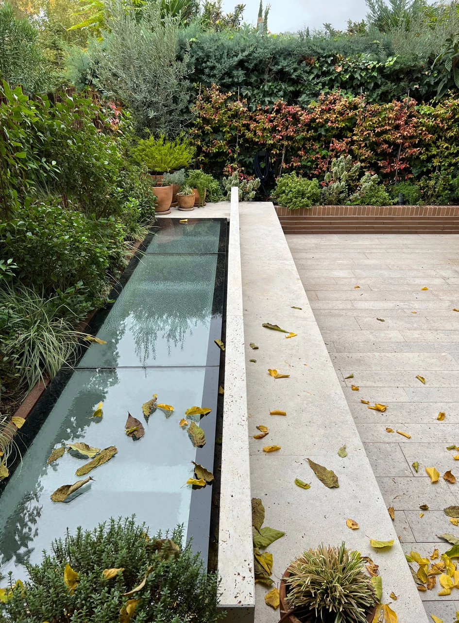 The underground spa at this domestic community in Madrid, Spain, connects areas like the pool and sauna (top, middle) to the world above with a skylight at the edge of the patio. Photos: Luis Asín