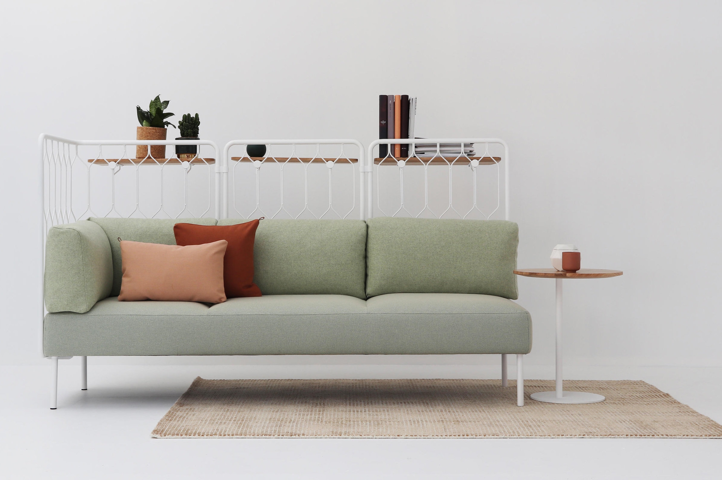 The sturdy base frame of the Rostrum Sofa from Prostoria (top) and the thick arms of Mariya from Andreu World (middle) are utilised as storage, while the Kove from Fora Form (bottom) has a metal frame that can extend into a partition