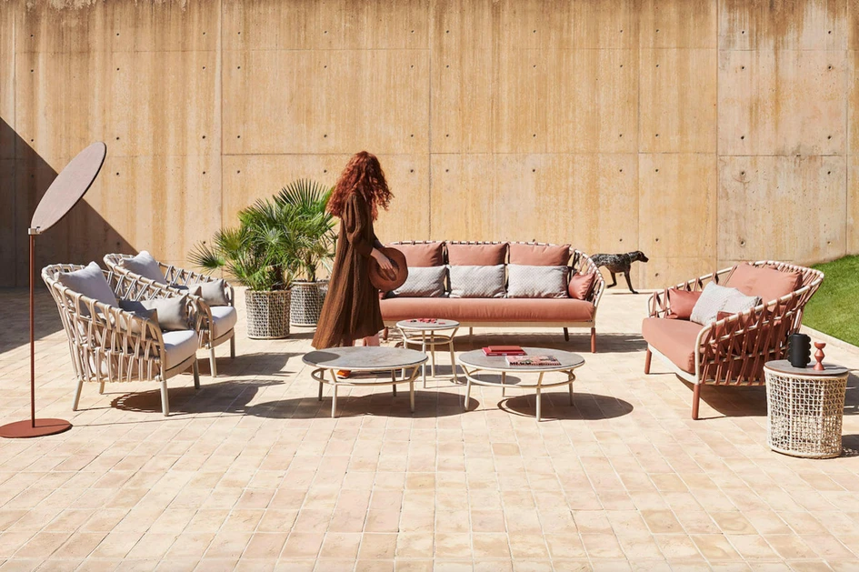 Furniture collections that wear their supporting frames on the outside like Emma Cross from Varaschin are suitable for outdoor areas, but the style is becoming popular for interior collections, too