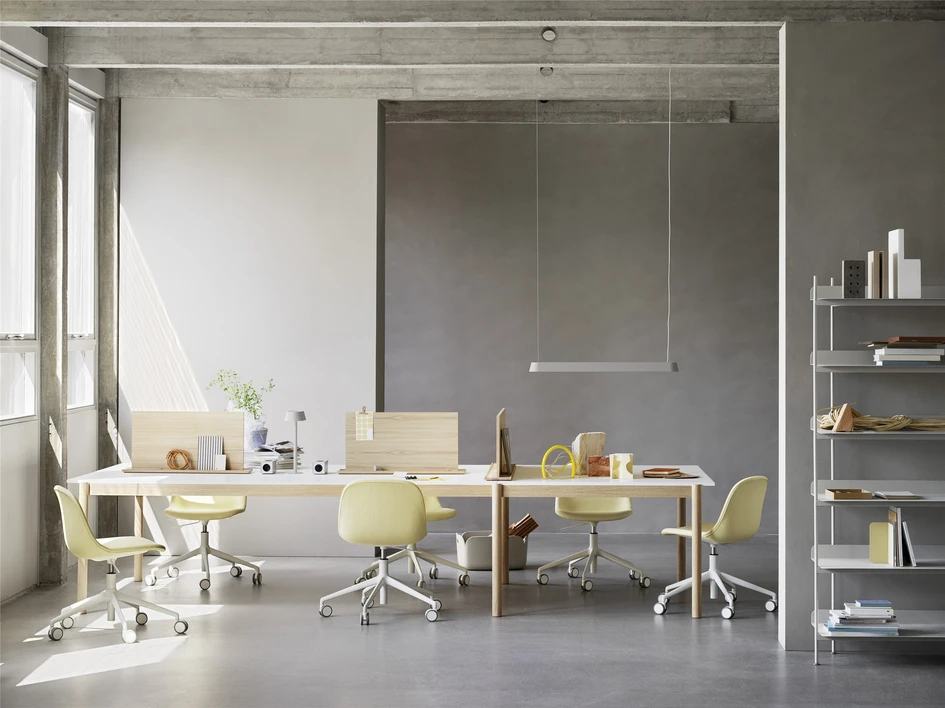 Muuto sets the scene for modern working and living; pictured here, the Linear System Modular Table with other Muuto products