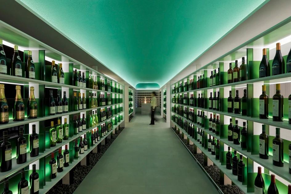 With a green ceiling lit from below and walls of green frosted glass panels behind each bottle, MOWa’s central wine library passageway is like being inside the bottle itself. Photos: SOULGRAPH