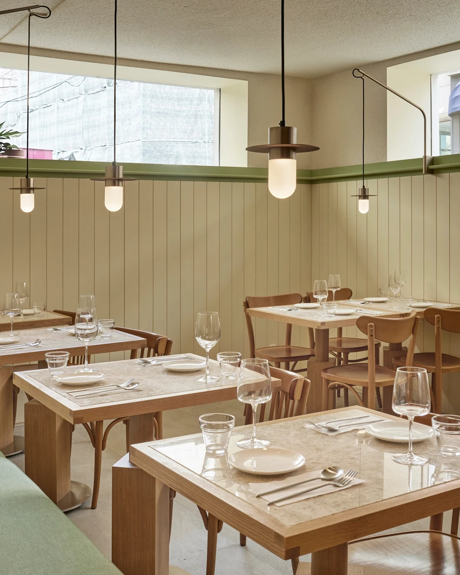 Custom-made fishing-rod-like pendant lights fixed to the mouldings are able to position orbs of soft, glowing light anywhere in three dimensions for flexible, intimate lighting. Photos: Roh Kyung