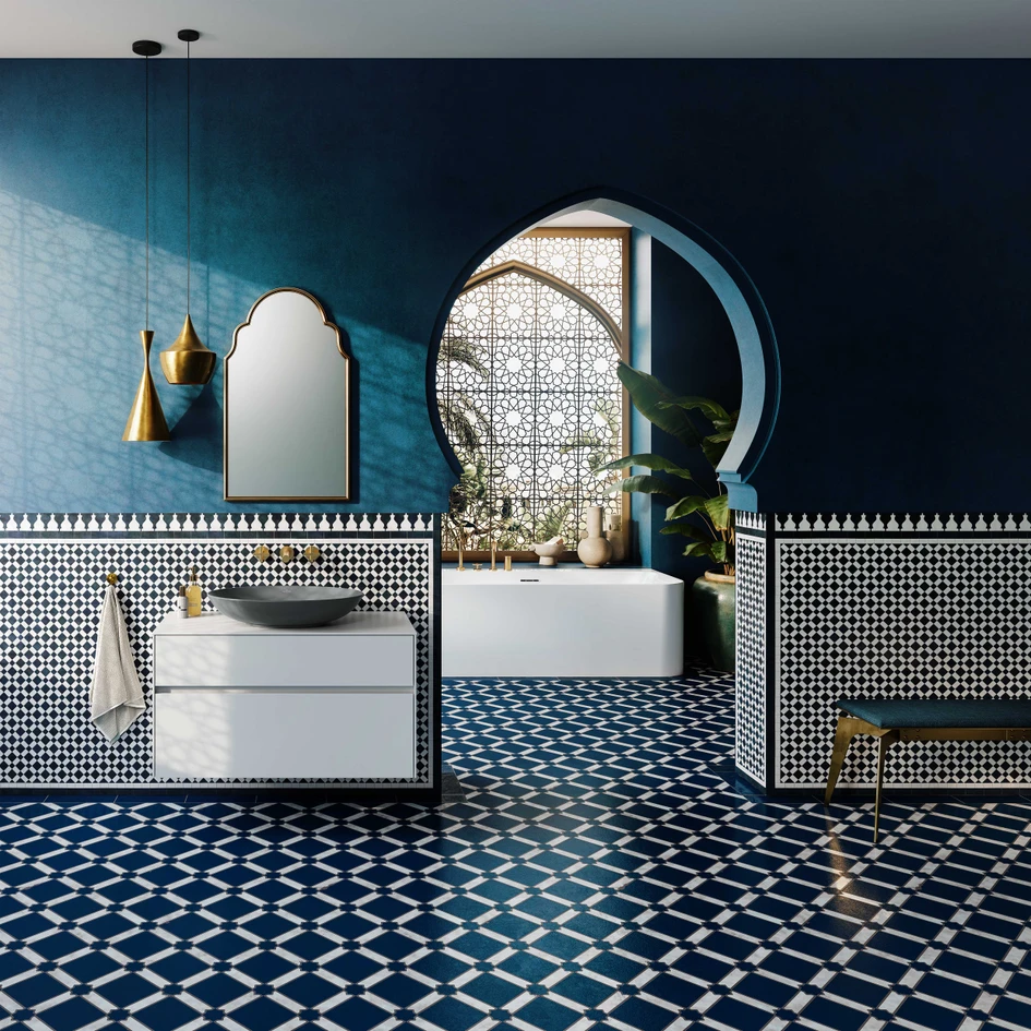 Mithilfe der Kollektion Loop & Friends von Villeroy & Boch lassen sich vielerlei Farbreferenzen auf gerade einmal fünf Nuancen reduzieren. Ein Bad mit Aufsatzwaschschale in „Graphite“ hier in Anspielung an einen Tempel in Marrakesch