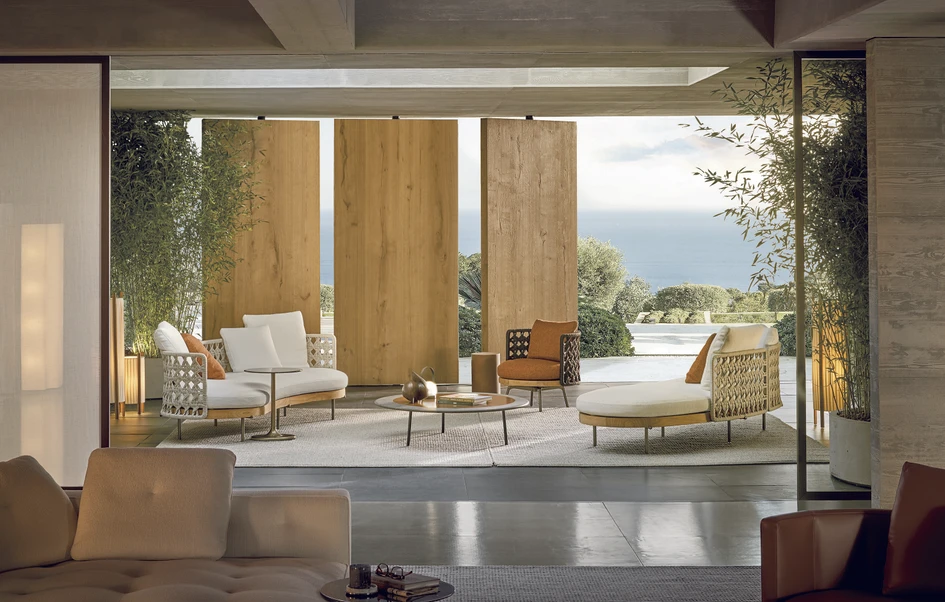 Meet the cocooning forms and organic lines of the new Torii Nest Outdoor family of seats designed by nendo for Minotti