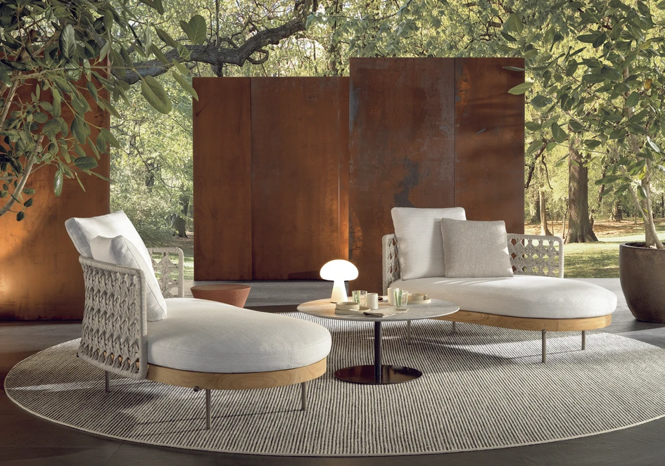 The generous forms of the Torii Nest Outdoor loveseat (above) and the Torii Nest Outdoor paolina (below) offer ultimate outdoor elegance
