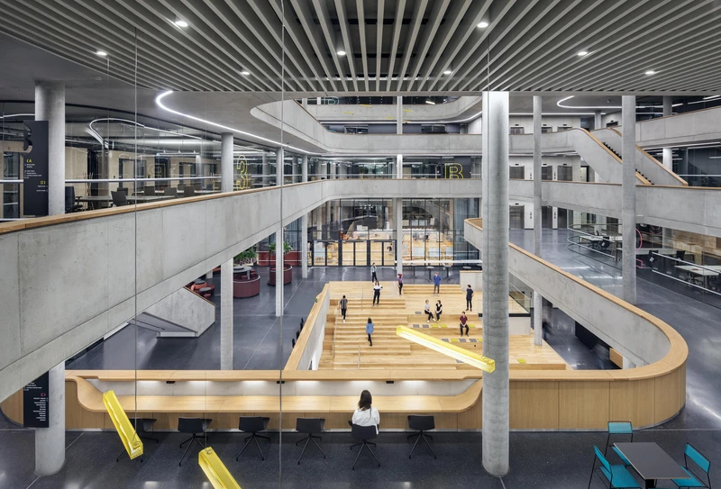 The Zalando Headquarters uses its atrium to create 'a variety of visual relationships around a clearly defined centre.' Photo: Werner Huthmacher