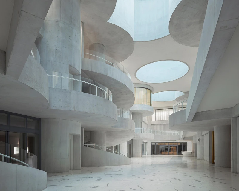 'Spiralling staircases and cascading walkways crisscross the Lindt Home of Chocolate's vast atrium.' Photo: Walter Mair