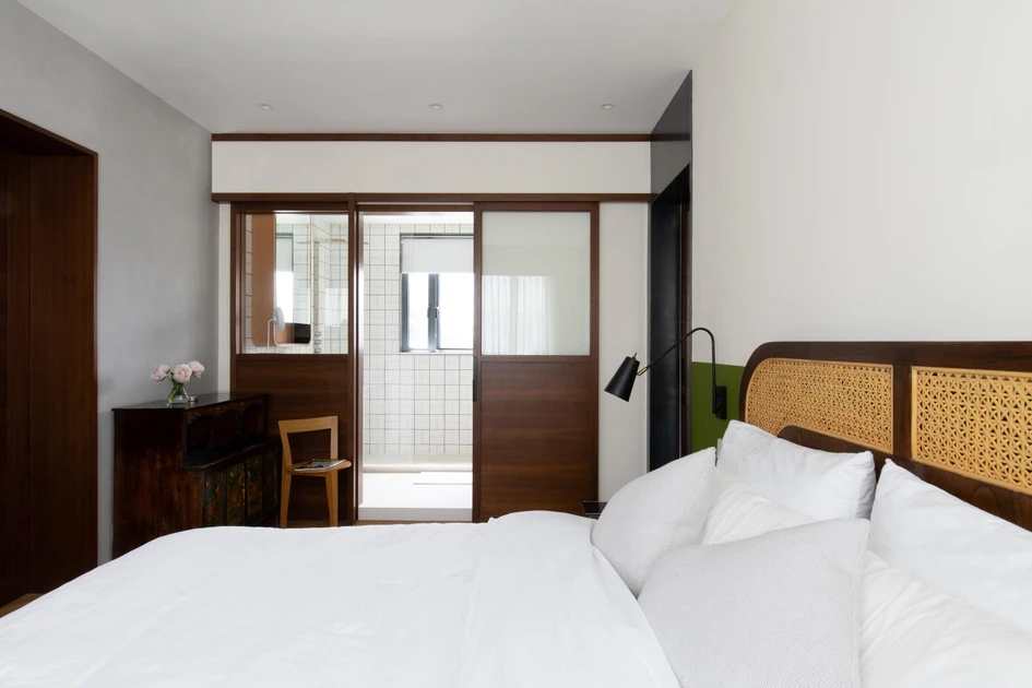 Vintage-style wood was chosen as the backdrop to creates a warm and inviting sanctuary throughout the rooms at Wan Chai Mid-Leveles. Photo: Keith Chan