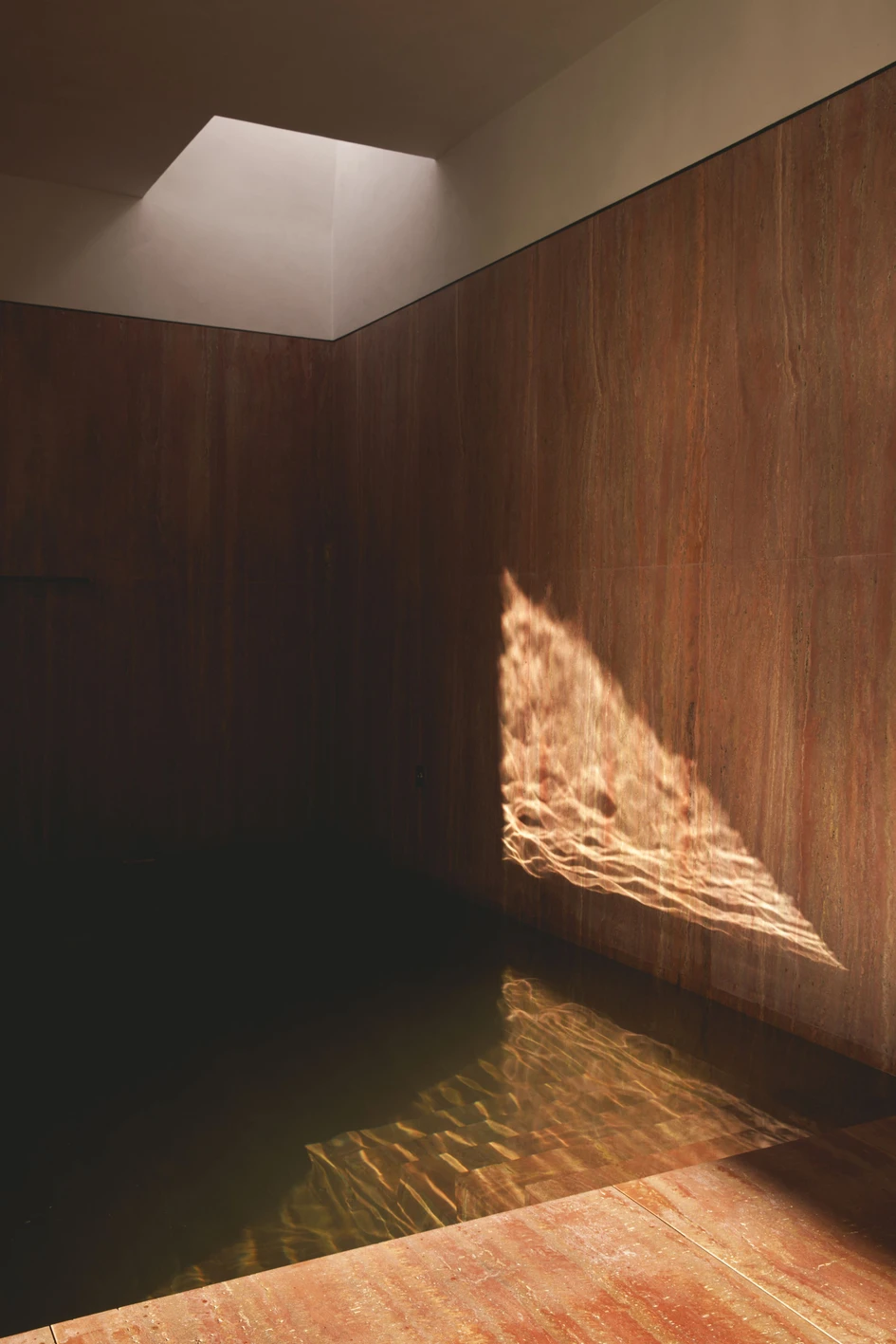 All interior spaces at Olivos House – including bathrooms traditionally more separated from view – offer visual connections to the olive fields, a defining feature of the region. Photo: Salva-Lopez