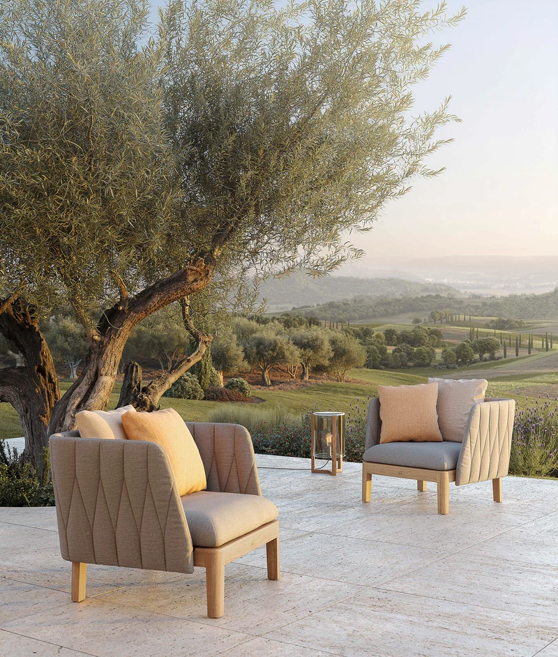 Low and comfortable lounge furniture designed for outdoor conditions encourages more social gatherings and leisure time spent outside, surrounded by nature's splendor