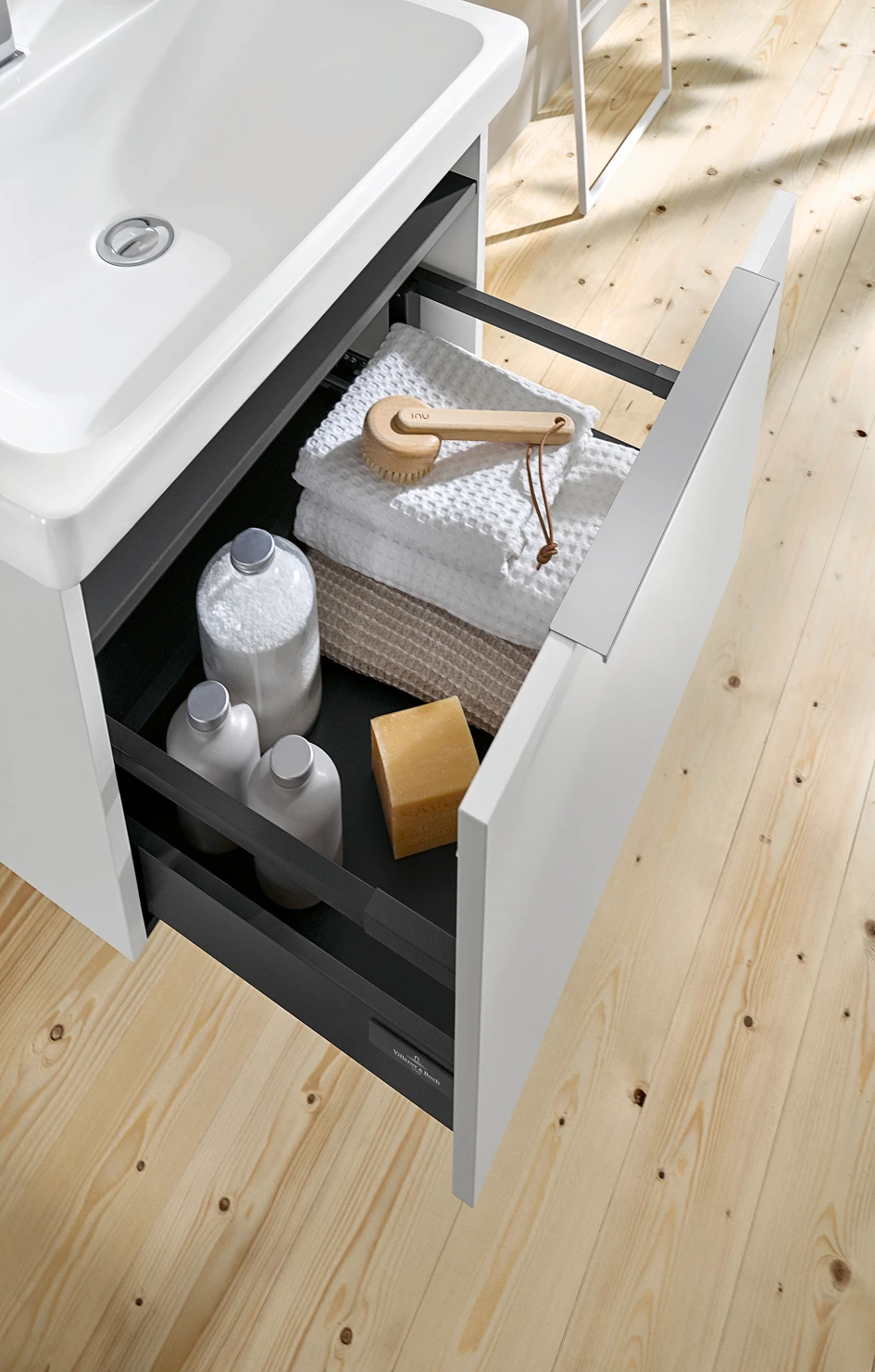 Both the tall cabinets and the vanity units offer generous and versatile storage space