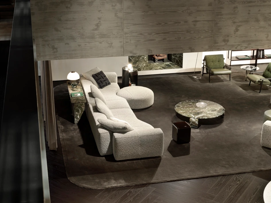 The asymmetrical modules of the Yves seating system by Hannes Peer, framed by the architectural Minotti Pavilion