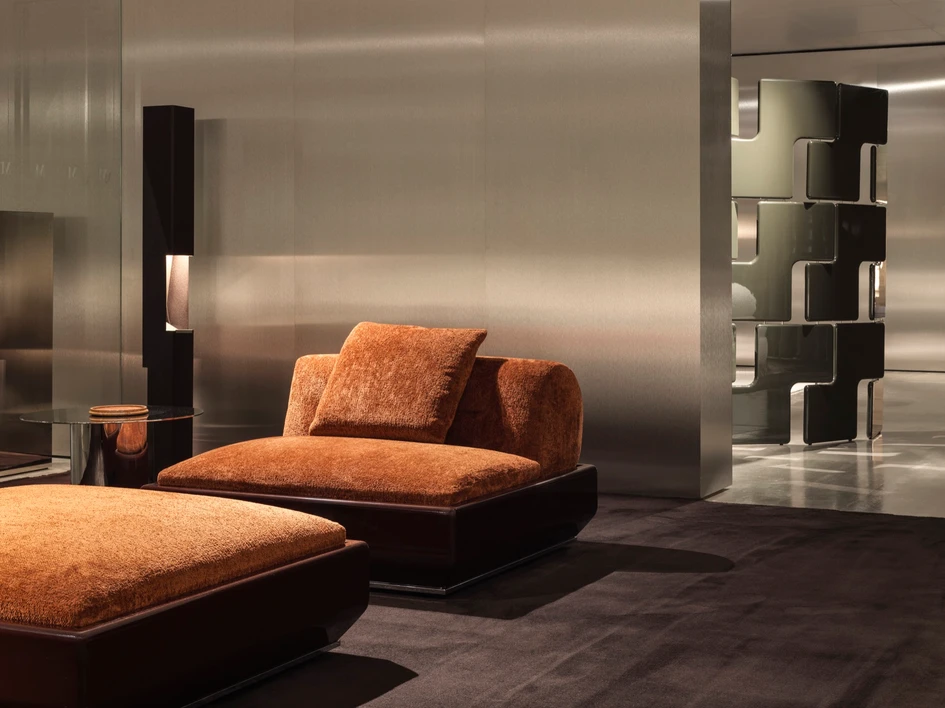 A 70s-inspired scene; the Supermoon armchair and ottoman by Giampiero Tagliaferri, as well as the Janis screen by Hannes Peer