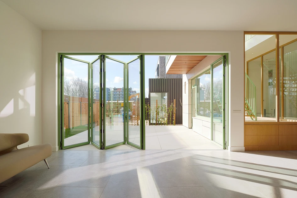 Endless possibilities: Whether in urban or rural settings, residential or office spaces, new builds or renovations – made from wood, aluminum, or in vibrant colors – Solarlux bi-folding doors are adaptable to any scenario. © Philip Jintes
