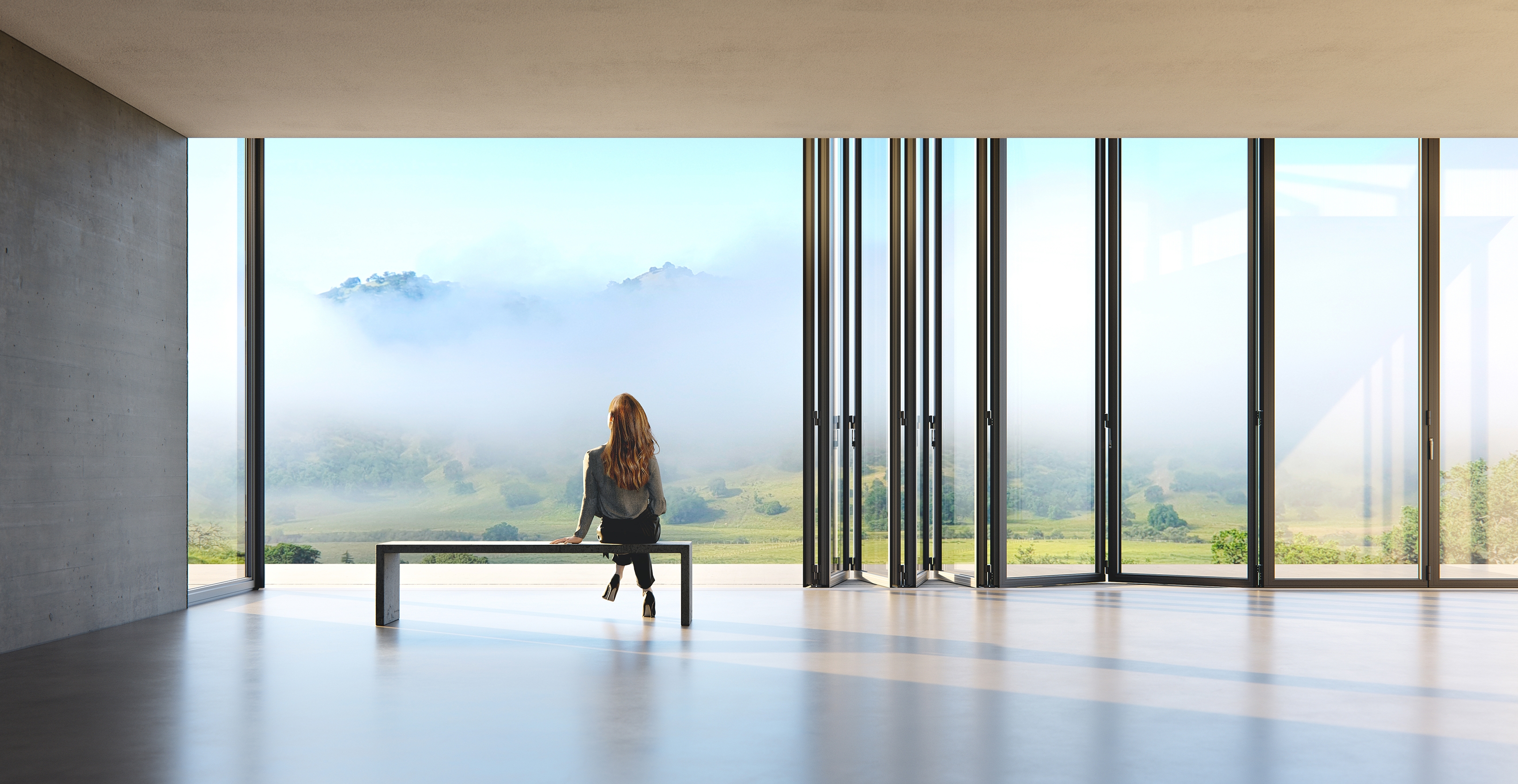 Pushing boundaries: The new Megaline system enables the implementation of bi-folding doors with exceptionally tall and wide glass elements, bringing nature within reach