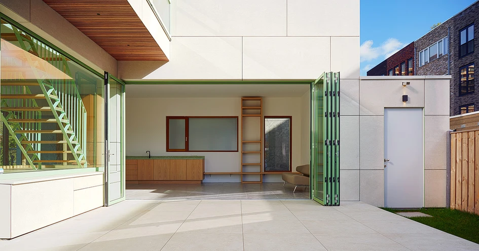 Customised solutions: For an Amsterdam city villa designed by Studio RIANKNOP, the Ecoline system was implemented in a pale green colour to match the color scheme. © Philip Jintes