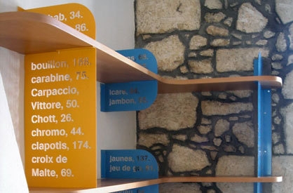 Detail of the bookcase in the dining area