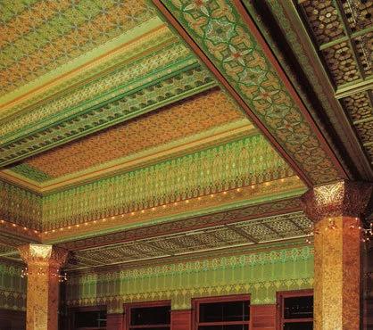 From 'Architecture and Property': "Happy Together?" by Catherine Ingraham: The reconstructed Chicago Stock Exchange Trading Room (orig. 1893-94, by Adler & Sullivan) showing ornamental stenciling on ceilings and walls.