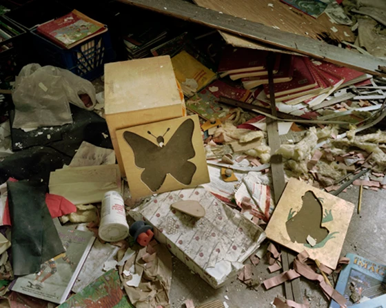 Not even two years closed, the Jane Cooper Elementary School has been looted of all its scrappable metal and has had its windows broken or removed, while classroom materials are left to decay; photo Sean Hemmerle