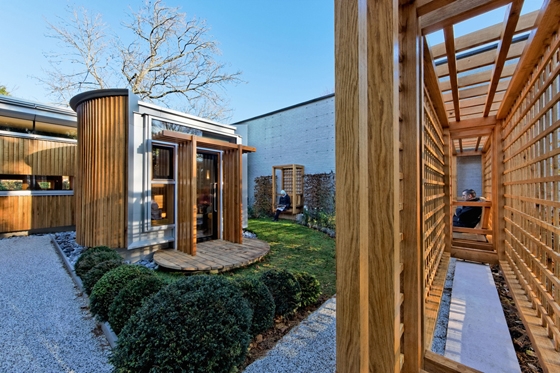 The gardens at Maggie's Cheltenham feature two small 'refuges' where users can find privacy, as well as various other secluded seating areas; architecture: MJP Architects, photo: Peter Durant