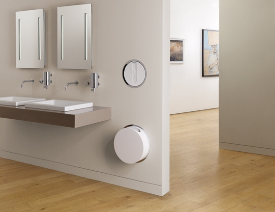 Perfect geometry in the bathroom: Vola's new 'Round Series' paper-towel dispenser and disposal receptacle, designed by Danish architectural practice Aarhus Arkitekterne
