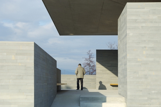 Architektura Krušec's chapel design deliberately directs the gaze of visitors, once inside the chapel, across the striking surrounding landscape, while masking off views of the immediate cemetery's tombstones; photos Miran Kambič
