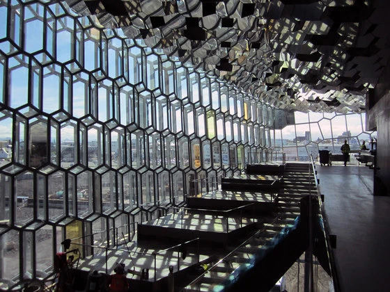 The architects collaborated with celebrated Danish-Icelandic artist Olafur Eliasson, whose striking 'quasi-brick' glass façade exploits the natural light of the building's location to produce a dynamic play of colours; photo © Osbjørn Jacobsen