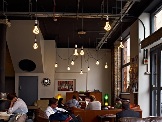 A contract-space application of Wilkinson's 'Plumen 001' light bulbs; photo Tom Mannion