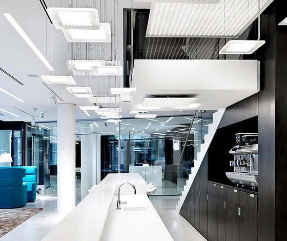 A ‘cloud’ of LED fixtures hangs in the entrance of furniture brand Bene’s Vienna showroom.
