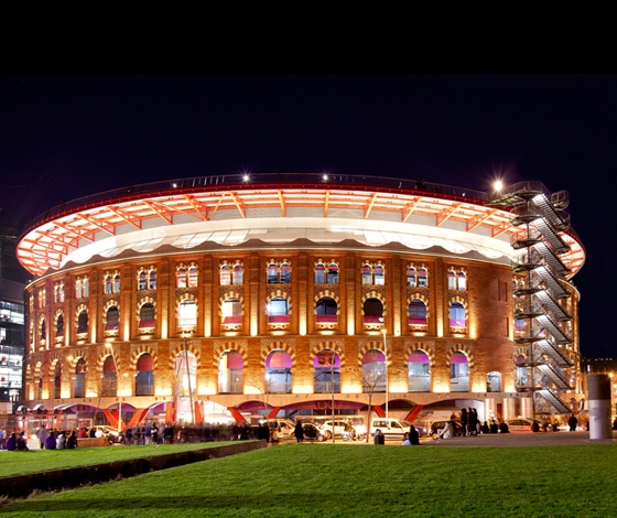 RGB LEDs light the spectacular 1899 Neo-Mudéjar façade of Las Arenas in Barcelona; photo © LEDS-C