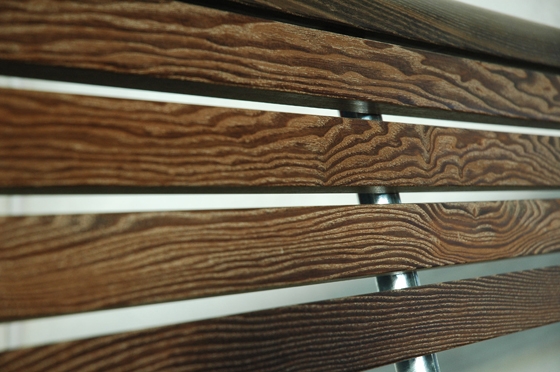 Detail of a Landi bench materialised in Natwood
