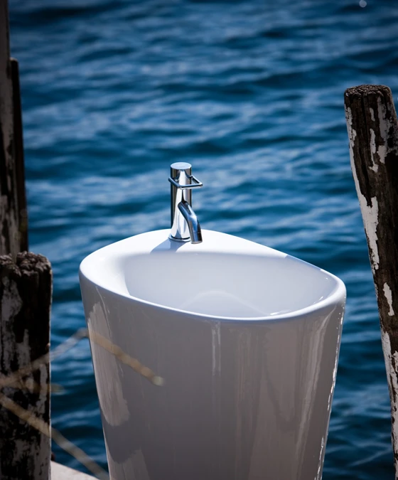 <b>The one and only</b>: The monolithic 'Menhir' free-standing wash basin marries, like the rest of the collection, organic curves with a healthy dose of the rational