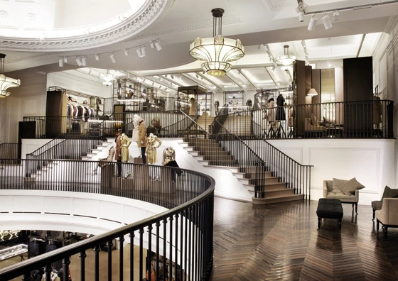 …and embedded radio-frequency identification technology, woven into selected garments and accessories, which triggers relevant multimedia content (such as footage from catwalk shows) on screens that double as changing-room mirrors