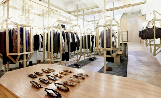 The LN-CC (Late Night Chameleon Café) store in Dalston, London, takes a theatrical, highly curated approach to retail design. Conceived of by set designer Gary Card, the shop delivers visitors to its product rooms via a wooden tunnel