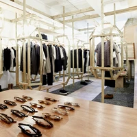 The LN-CC (Late Night Chameleon Café) store in Dalston, London, takes a theatrical, highly curated approach to retail design. Conceived of by set designer Gary Card, the shop delivers visitors to its product rooms via a wooden tunnel