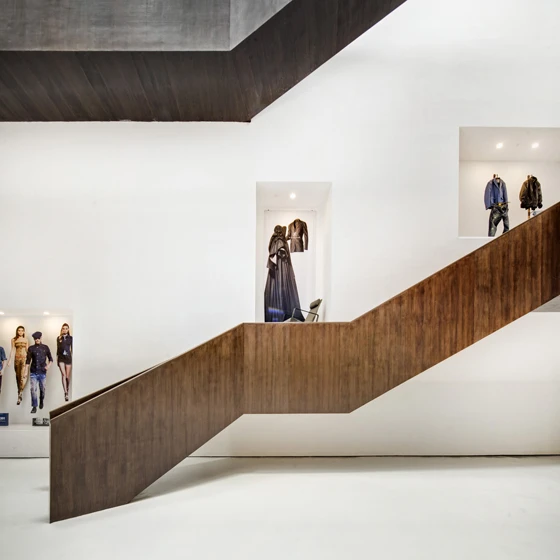 Shanghai architects Neri&Hu’s design for Design Republic’s Design Collective store, also in Shanghai, took the opportunity while refurbishing an existing building of installing a show-stopping wrap-around staircase within the main exhibition space