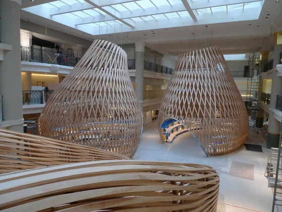 Hermès’ flagship store on Paris’s Rue de Sévres plays with architectural space, turning the experience of shopping into one of discovery. Freestanding ash pavilions sit within the fashion brand’s new Left Bank home in an old 1930s swimming pool