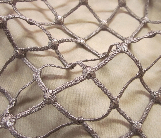 Squaring up: 'Copelia' from Equipo DTR is a mesh fabric where precise needlework creates a strongly geometric field