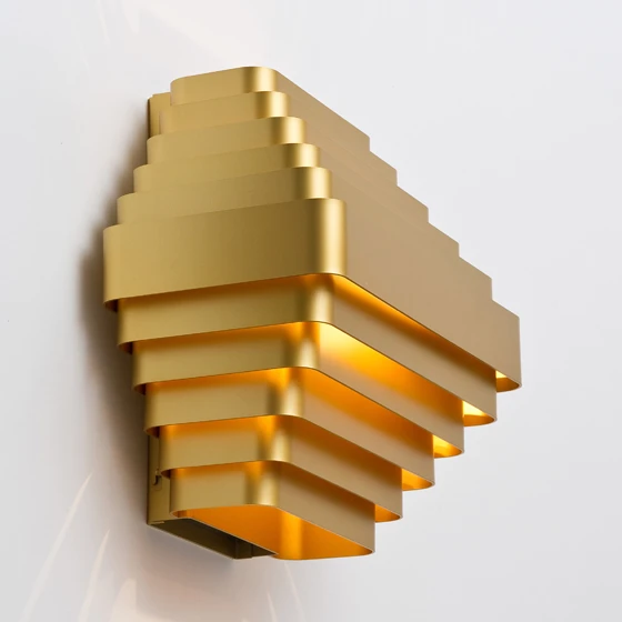 A new addition to the <b>Wever & Ducré</b>-produced 'J.J.W.' family of lighting designs by Belgian architect Jules Wabbes, this new wall lamp marries a Deco aesthetic with up-to-date production technology