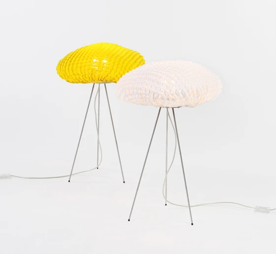 <b>Arturo Alvarez</b>’s ‘Tati’ collection of lamps feature a woven, highly textured skin that wrap around the lighting element, creating a dappled illumination effect
