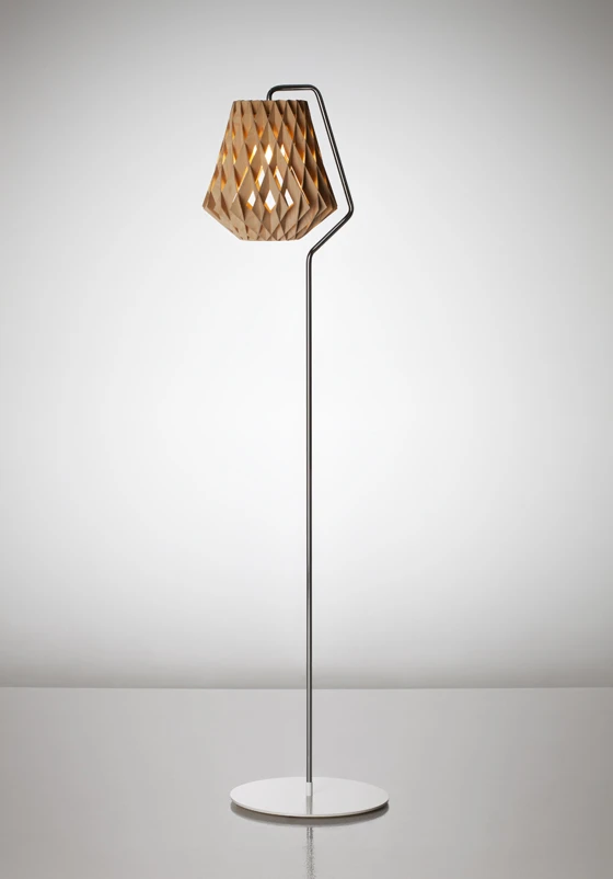 Finnish handcraft meets ultra-modern computer geometry with ‘Pilke 28 Floor’, a new floor lamp designed by Tuukaa Halonen for <b>Showroom Finland</b> for their growing Pilke plywood lighting family