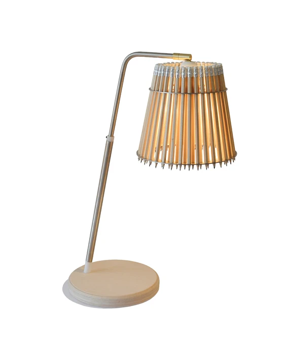The everyday object that is the pencil is, through repetition, repurposed by <b>Tom Rossau</b>, functioning as a light shade in his new family of 'Pencil Lamps'