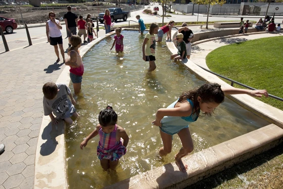 Hoerr Schaudt’s The Circle in Normal, Illinois, is both traffic roundabout and sustainable garden: stormwater collected from adjoining streets is stored in an underground cistern, then used to fill a popular water feature; photos Scott Shigley
