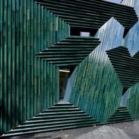 Manuel Herz’s arrestingly jagged Jewish Community Centre in Mainz, Germany is clad in glazed, bottle green ceramic tiles; photos Iwan Baan