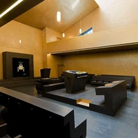 The walls of the centre’s interior are covered in densely packed Hebrew letters; photo Iwan Baan