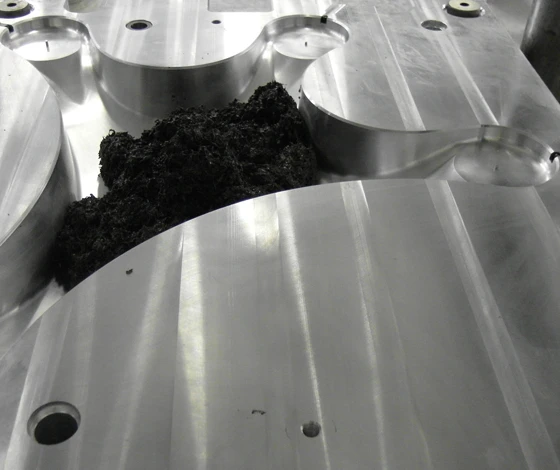 FluidSolids serves to create architectural space in the form of Architonic's Concept Space IV (top), and moulding one of the uniform, repeated elements for the project (above)